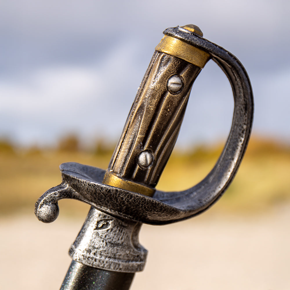 Close up on Classic Curved Cutlass grip and steel guard